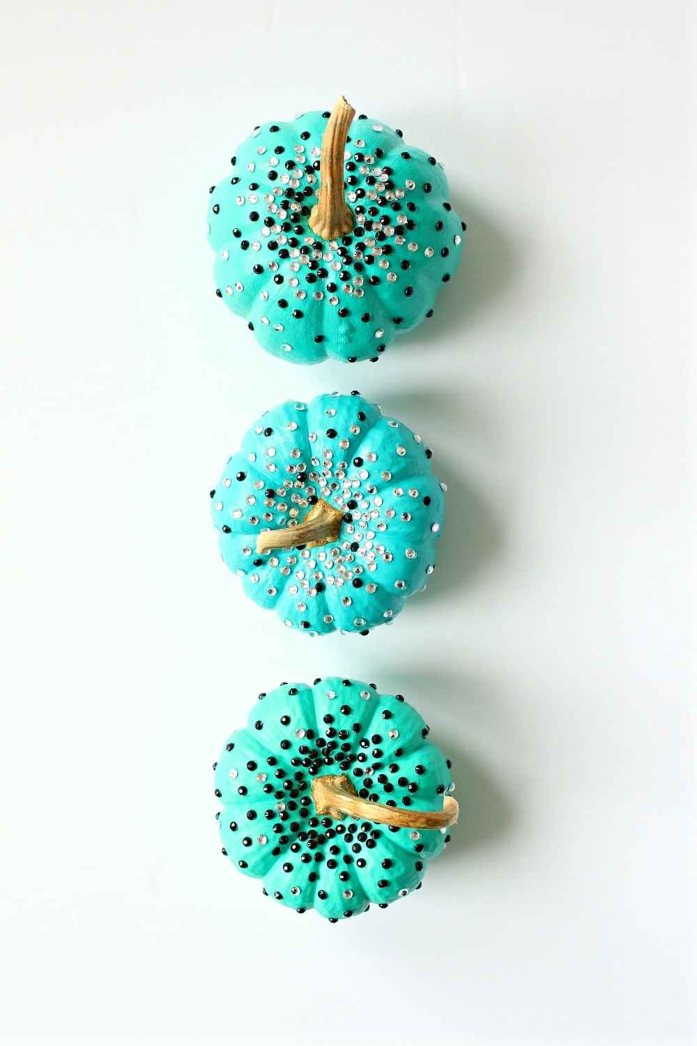 Turquoise DIY No Carve Pumpkins with Black and White Rhinestone Sparkles