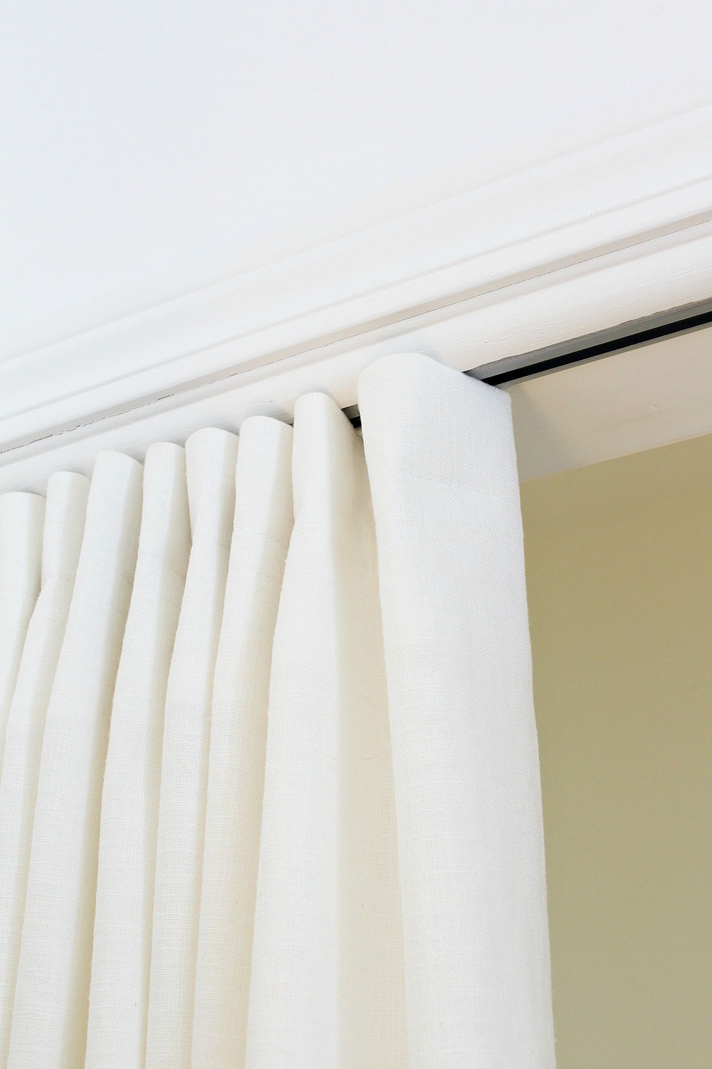 Simple DIY Curtain That Hides a Track – How I’m Hiding My Closet “Gym” |